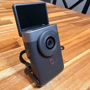 Canon Black PowerShot v10 Compact Camera with strap